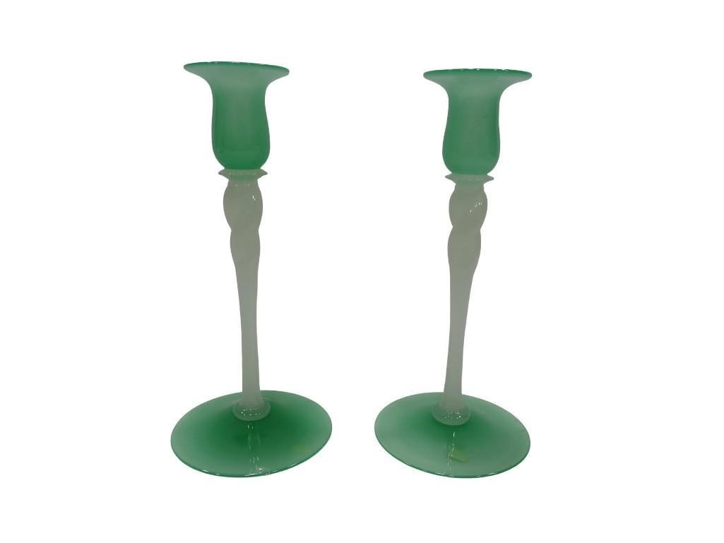 Pair of Steuben Glass Candlesticks with Jade Green Circular Foot and Flared Rim: Pair of Steuben Glass Candlesticks with Jade Green Circular Foot and Flared Rim All pictures are considered part of the description and should be examined carefully by bidders. Live Auctioneers is