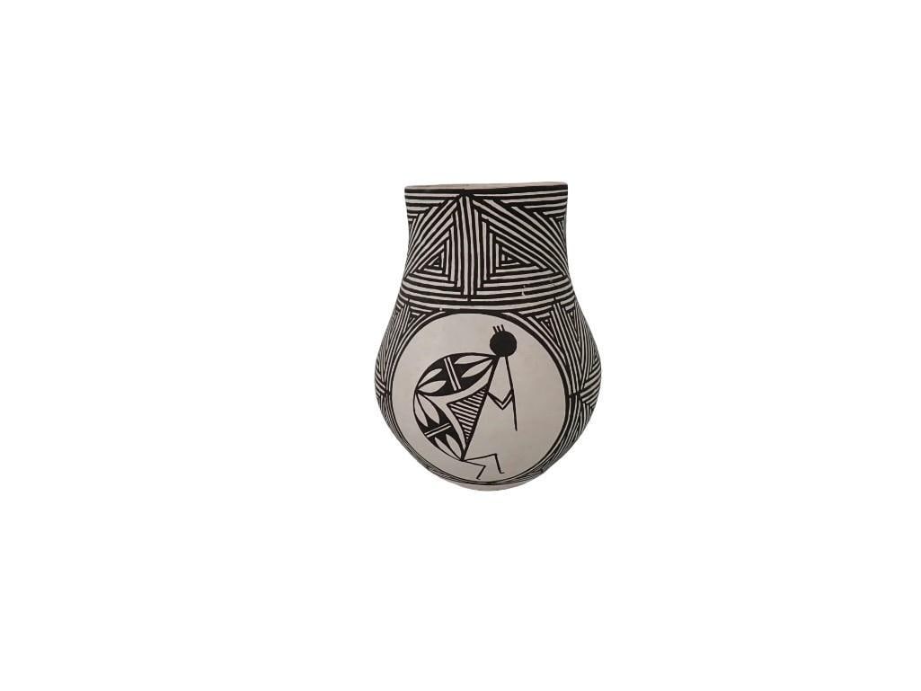 Signed Acoma Pottery Pueblo Pot with Kokopelli design: Signed Acoma Pottery Pueblo Pot with Kokopelli design All pictures are considered part of the description and should be examined carefully by bidders. Live Auctioneers is now offering Live Shipping th