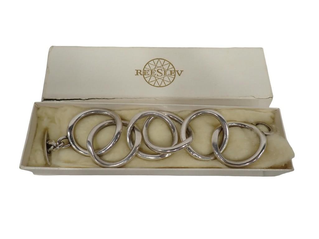 Danish Reeslev Sterling Silver Link Bracelet. Toggle Stamped "Handmade Sterling Denmark RS". With bo: Danish Reeslev sterling silver link bracelet. Toggle Stamped "Handmade Sterling Denmark RS". With box Length: 8 1/2" Weight: 64 dwt All pictures are considered part of the description and 