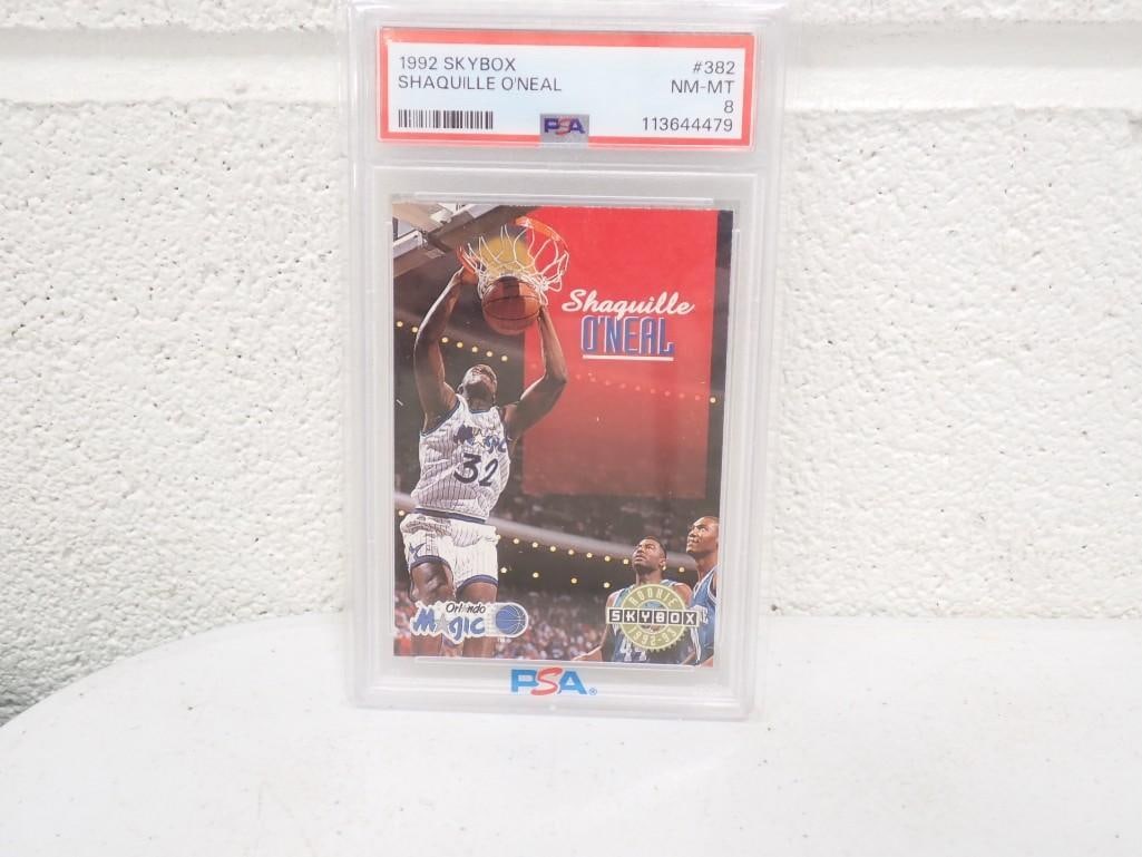PSA Graded 8 1992 Skybox Shaquille O'Neal Skybox Rookie Basketball Card: PSA Graded 8 1992 Skybox Shaquille O'Neal Skybox Rookie Basketball Card All pictures are considered part of the description and should be examined carefully by bidders. Live Auctioneers is now