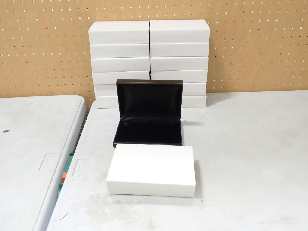 13 New leatherette / vinyl boxes - could be for jewelry or necklaces or trinkets or whatever: 13 New leatherette / vinyl boxes - could be for jewelry or necklaces or trinkets or whatever All pictures are considered part of the description and should be examined carefully by bidders. Live Aucti