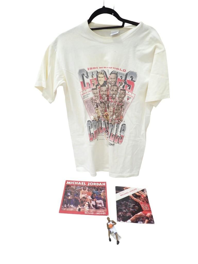 Chicago Bulls 1991 World Camps T-Shirt, Michael Jordan Figurine and Books: T-Shirt, Michael Jordan Figurine and Books All pictures are considered part of the description and should be examined carefully by bidders. Live Auctioneers is now offering Live Shipping through them.