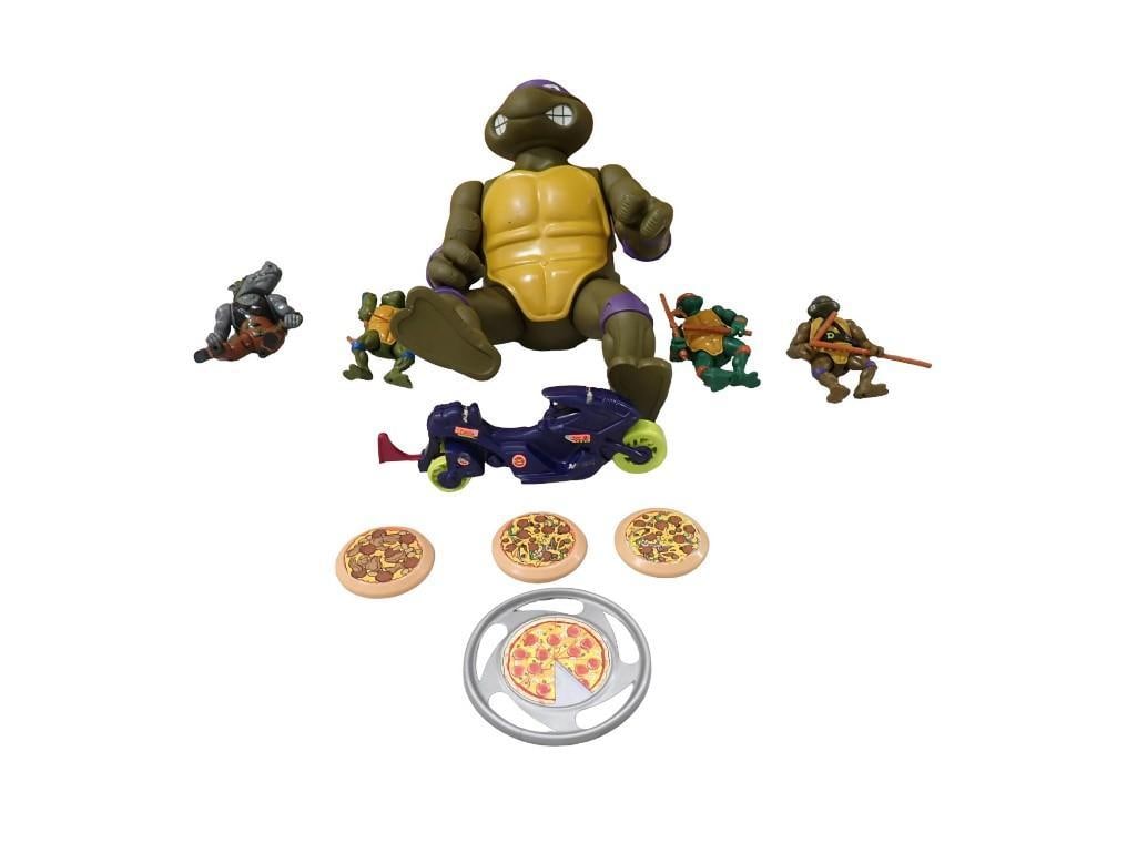 Teenage Mutant Ninja Turtles Lot including Figures, Motorcycle, pizzas: Teenage Mutant Ninja Turtles Lot including Figures, Motorcycle, pizzas All pictures are considered part of the description and should be examined carefully by bidders. Live Auctioneers is now offering