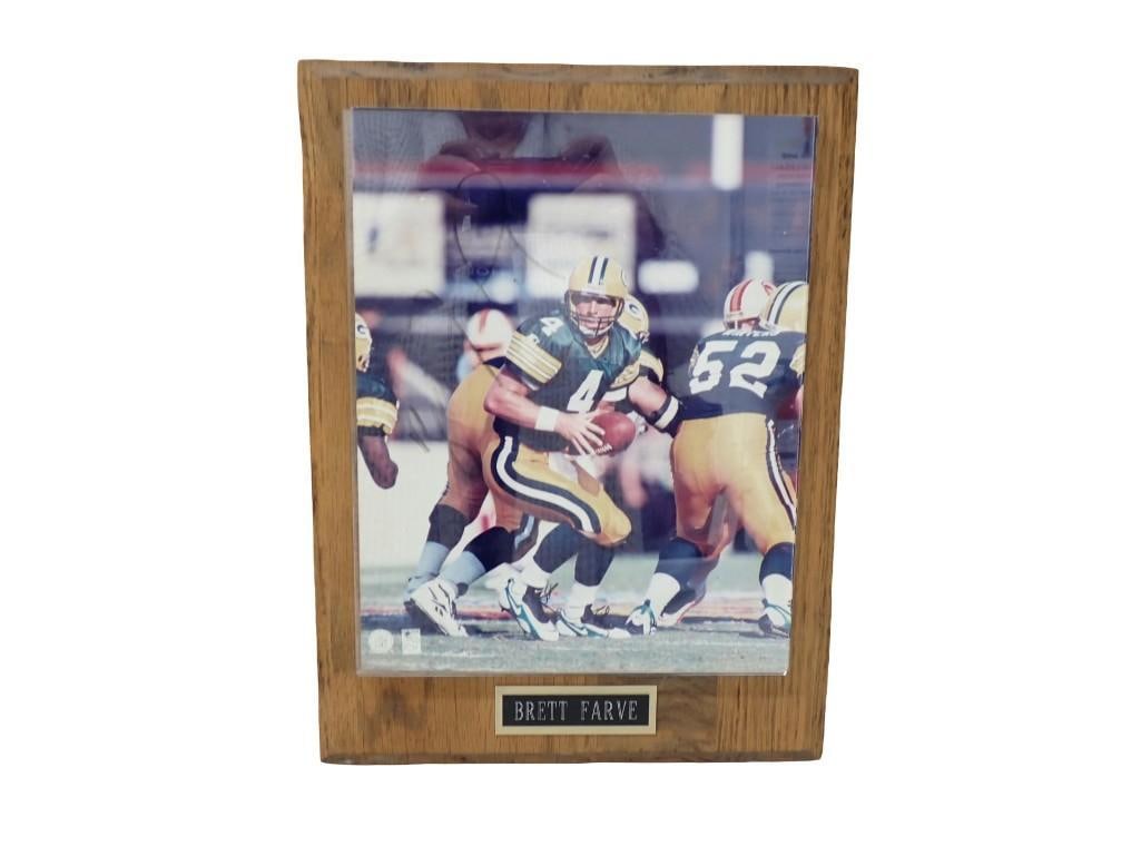 Brett Favre Autographed Plaque with COA: Brett Favre Autographed Plaque with COA All pictures are considered part of the description and should be examined carefully by bidders. Live Auctioneers is now offering Live Shipping through them. Th