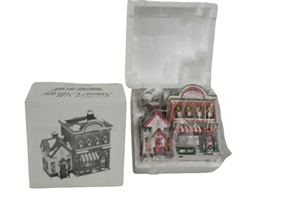 Department 56 Snow Village Mainstreet Gift Shop - with Box: Department 56 Snow Village Mainstreet Gift Shop - with Box All pictures are considered part of the description and should be examined carefully by bidders. Live Auctioneers is now offering Live Shippi
