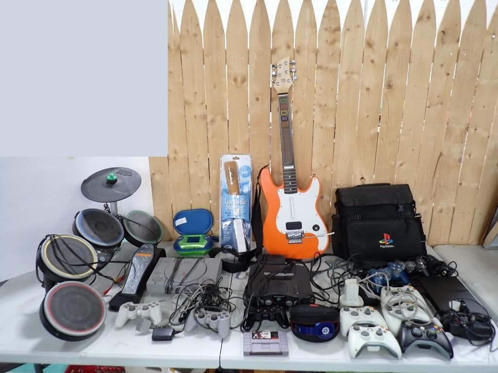 Large Video Game Lot including PlayStation, Nintendo 64, Leapster, Controllers, Drums, Guitar, Acces (1 of 15)
