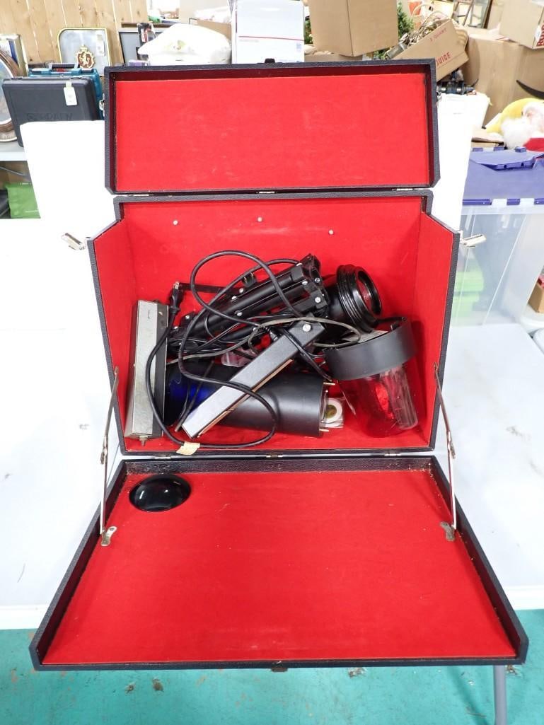 Lighting System with Hard Case and Projection Filters: Lighting System with Hard Case and Projection Filters All pictures are considered part of the description and should be examined carefully by bidders. Live Auctioneers is now offering Live Shipping th