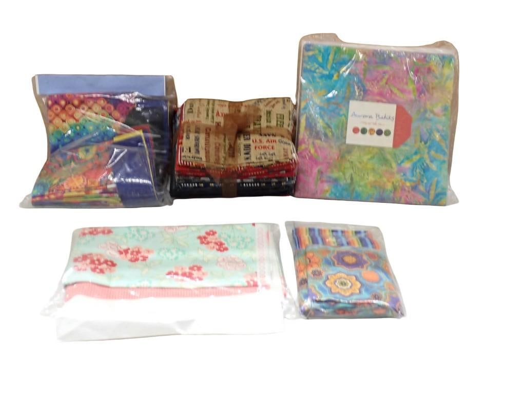 5 Separate Quilting Kits and/or Precut Fabric including Willy-Nilly, Moda Fabrics Kit, Aurora Batiks: 5 Separate Quilting Kits and/or Precut Fabric including Willy-Nilly, Moda Fabrics Kit, Aurora Batiks, Rustic USA/Military precut quit fabrics, etc. All pictures are considered part of the description 