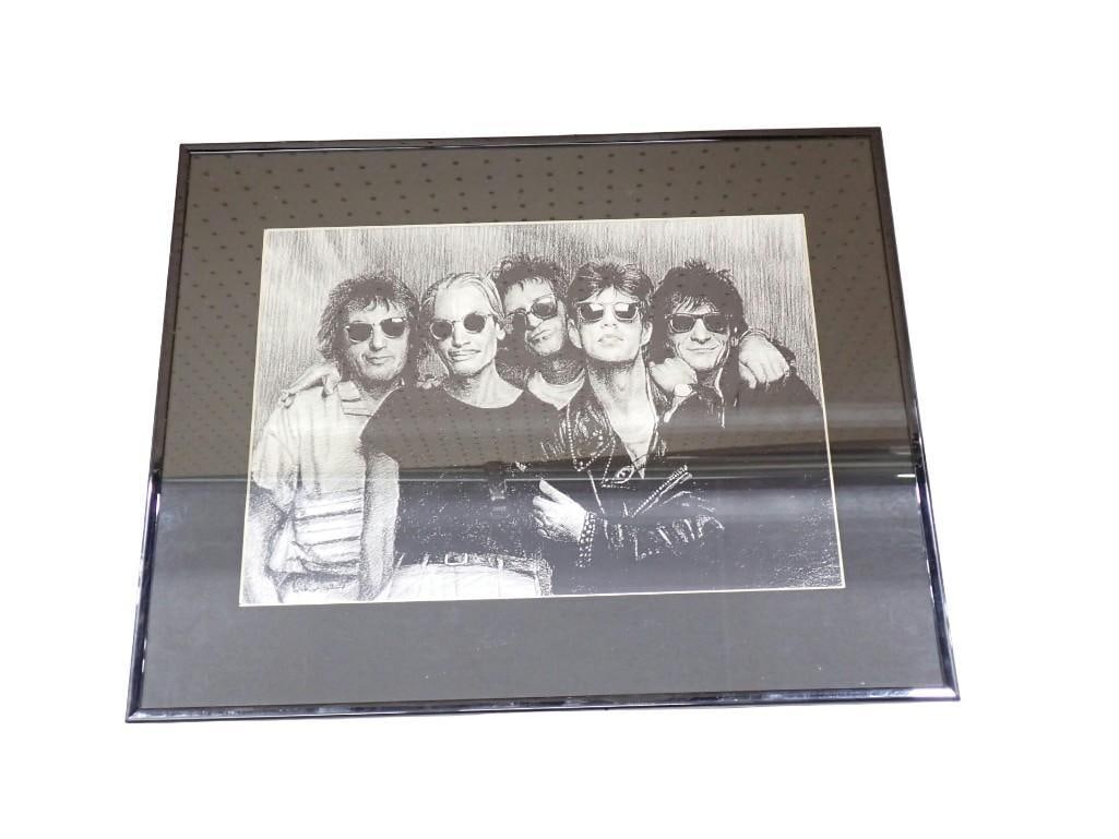 Framed Rolling Stones Print from 1999: Framed Rolling Stones Print from 1999 - signature appears to be part of the print - roughly 16x20" All pictures are considered part of the description and should be examined carefully by bidders. 