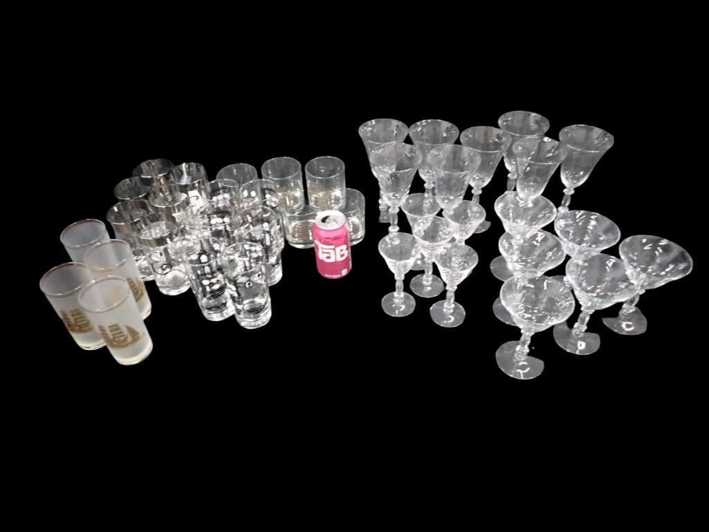 Glassware Lot including Libbey, Frosted Tumblers, Culver 22K Gold Gilt High Ball, etc.: Glassware Lot including Libbey, Frosted Tumblers, Culver 22K Gold Gilt High Ball, etc. All pictures are considered part of the description and should be examined carefully by bidders. Live Auctioneers