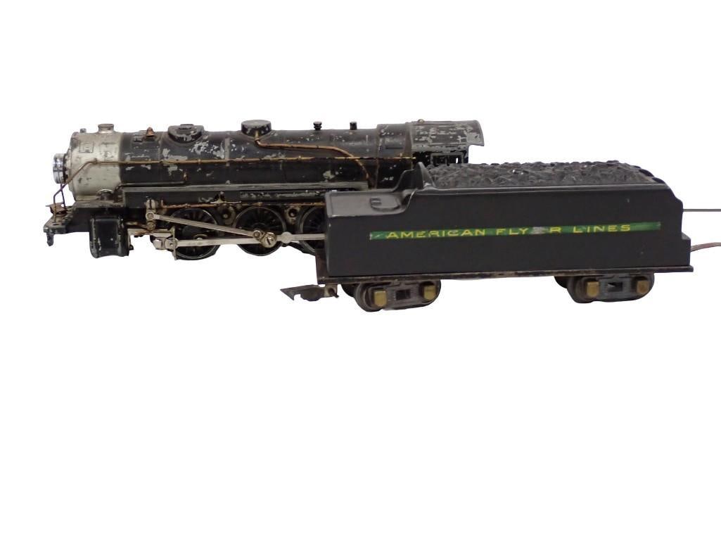 Vintage American Flyer Model Train and Tender Cars: Vintage American Flyer Model Train and Tender Cars All pictures are considered part of the description and should be examined carefully by bidders. Live Auctioneers is now offering Live Shipping throu