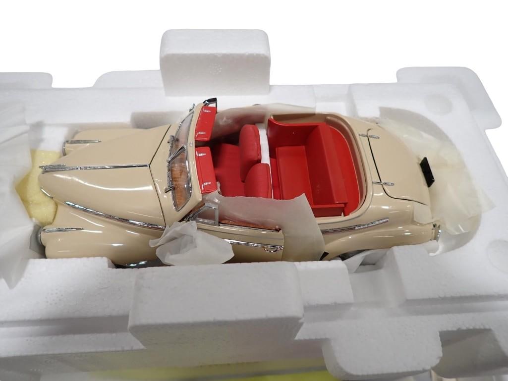 1:24 Scale Die Cast Model of a 1941 Chevrolet Special Deluxe Convertible by Danbury Mint: 1:24 scale diecast model of a 1941 Chevrolet Special Deluxe convertible model car by Danbury Mint in the original box with paperwork All pictures are considered part of the description and should be e
