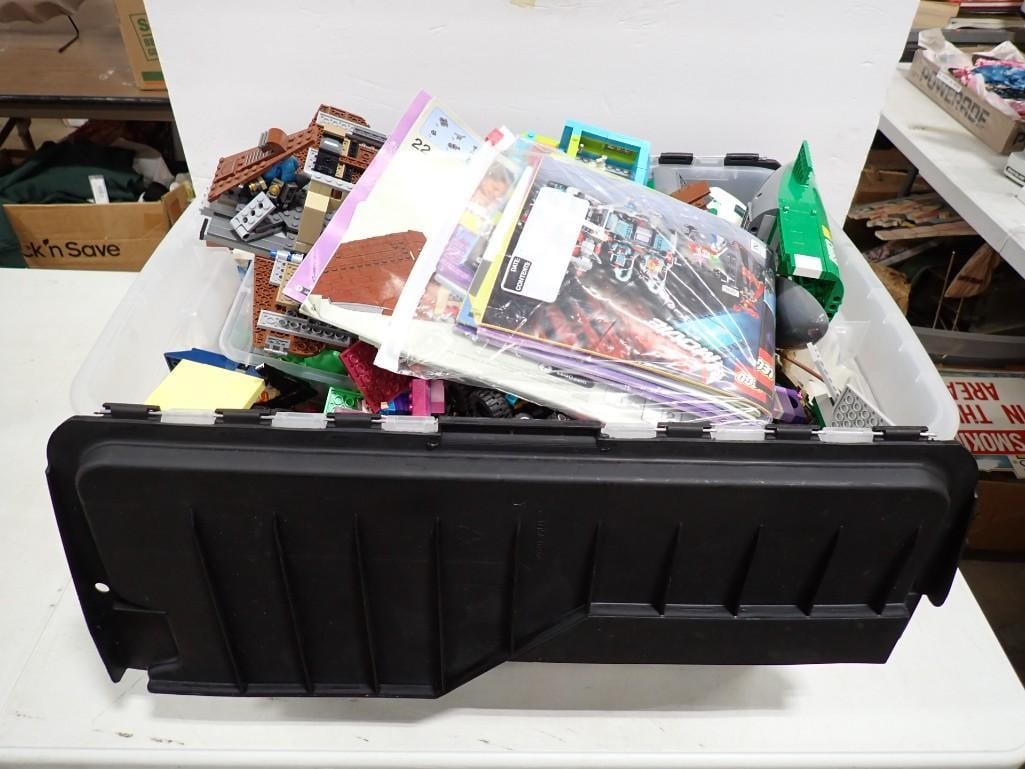 Large Bin full of Legos / Building Blocks, Mini Figs, etc.: Large Bin full of Legos / Building Blocks, Mini Figs, etc. All pictures are considered part of the description and should be examined carefully by bidders. Live Auctioneers is now offering Live Shippi