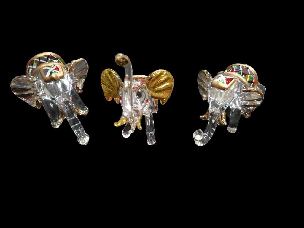 Lot of 3 Art Glass Elephants: Lot of 3 Art Glass Elephants All pictures are considered part of the description and should be examined carefully by bidders. Live Auctioneers is now offering Live Shipping through them. This is an op