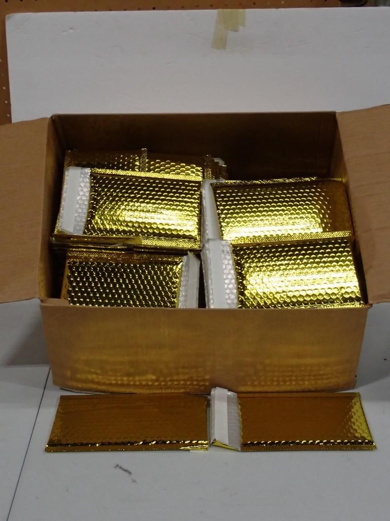 Case of bubble Padded Foil Mailing Envelopes - gold colored: Case of bubble Padded Foil Mailing Envelopes - gold colored All pictures are considered part of the description and should be examined carefully by bidders. Live Auctioneers is now offering Live Shipp