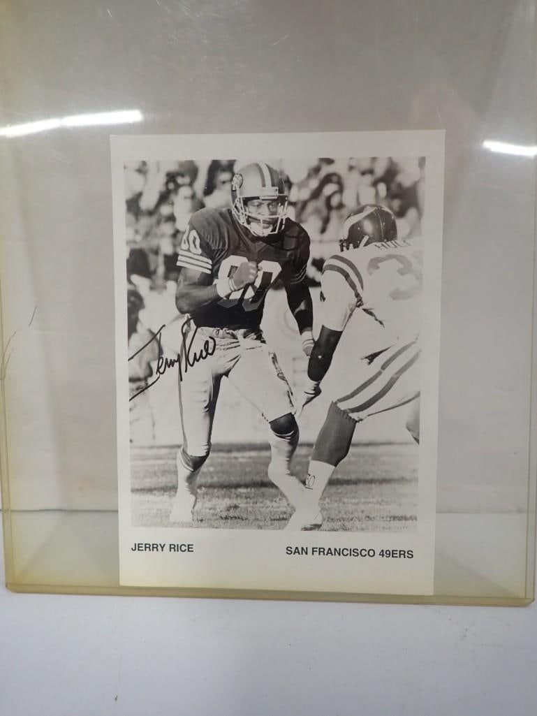 Jerry Rice Autographed Photo - no COA: Jerry Rice Autographed Photo - no COA All pictures are considered part of the description and should be examined carefully by bidders. Live Auctioneers is now offering Live Shipping through them. This