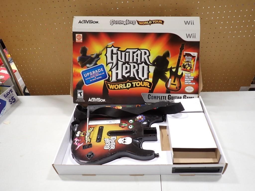 Guitar Hero World Tour For the Nintendo Wii: Guitar Hero World Tour For the Nintendo Wii All pictures are considered part of the description and should be examined carefully by bidders. Live Auctioneers is now offering Live Shipping through them