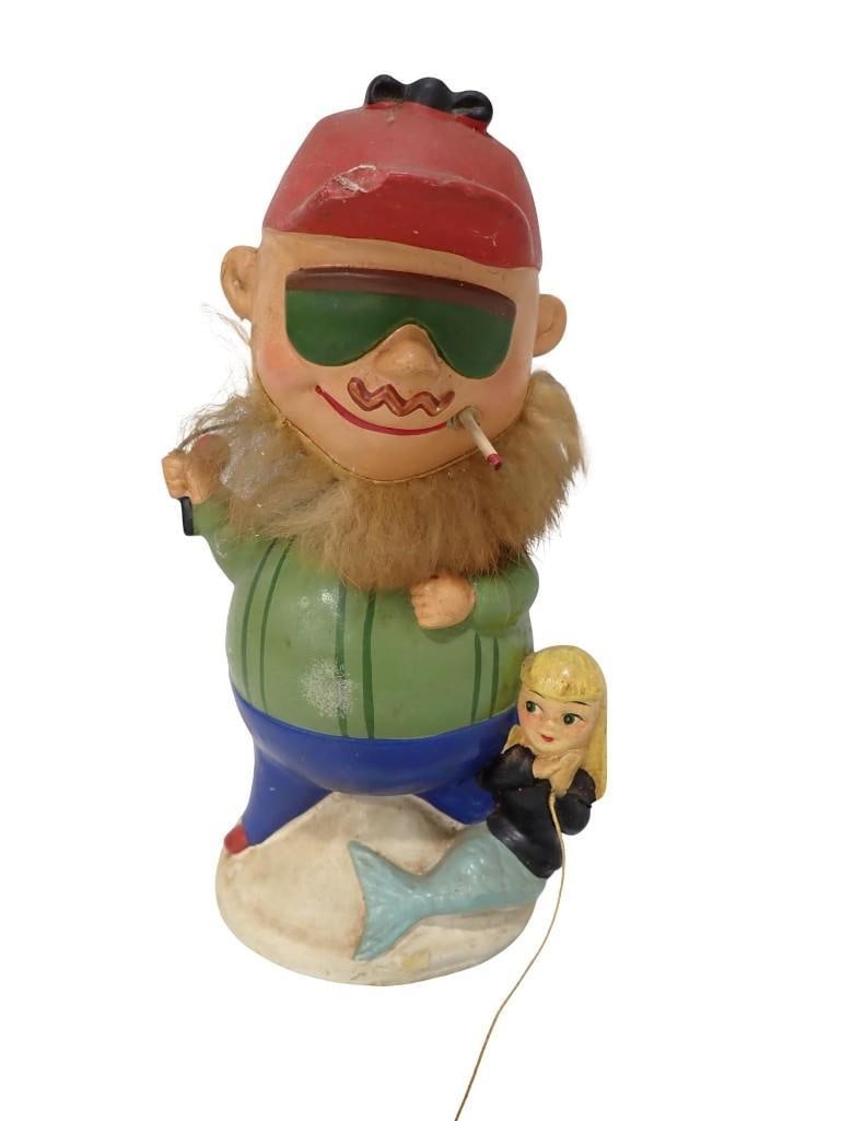 Vintage 1960s Lego Japan Chalkware Figure Featuring a Fisherman with a Cigar and Green: Vintage 1960s Lego Japan Chalkware Figure Featuring a Fisherman with a Cigar and Green Sunglasses All pictures are considered part of the description and should be examined carefully by bidders. 