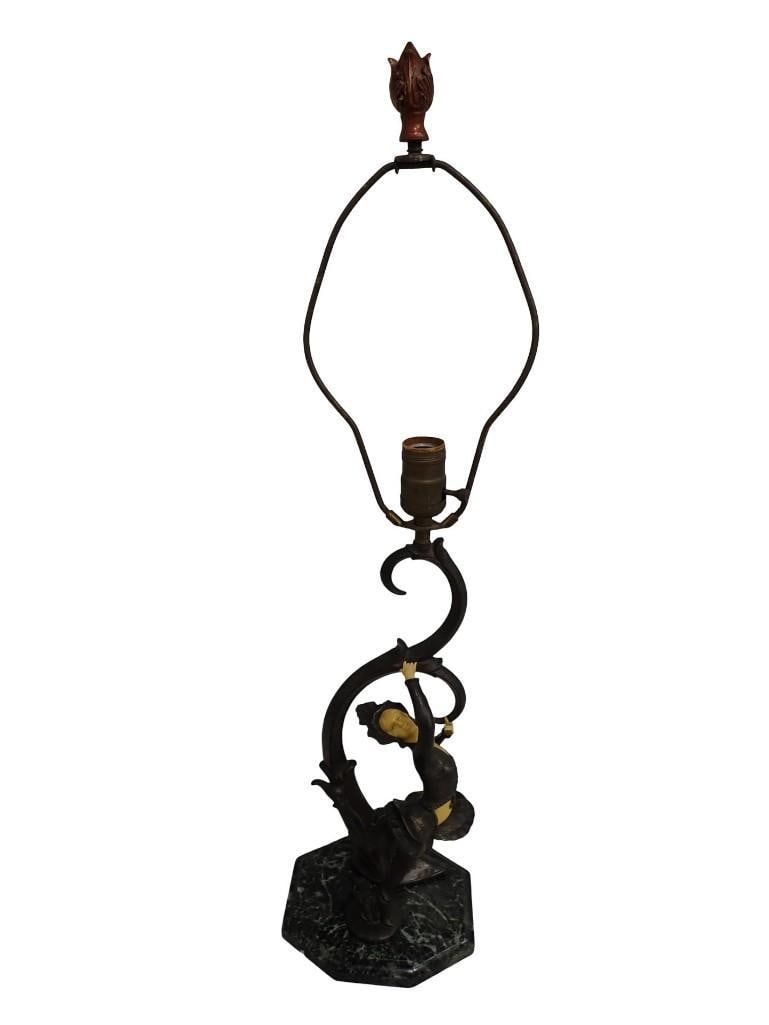Art Nouveau Style Lamp features a Sculpted Bronze Figure on a Marble Base: Art Nouveau Style Lamp features a Sculpted Bronze Figure on a Marble Base All pictures are considered part of the description and should be examined carefully by bidders. Live Auctioneers is now offer