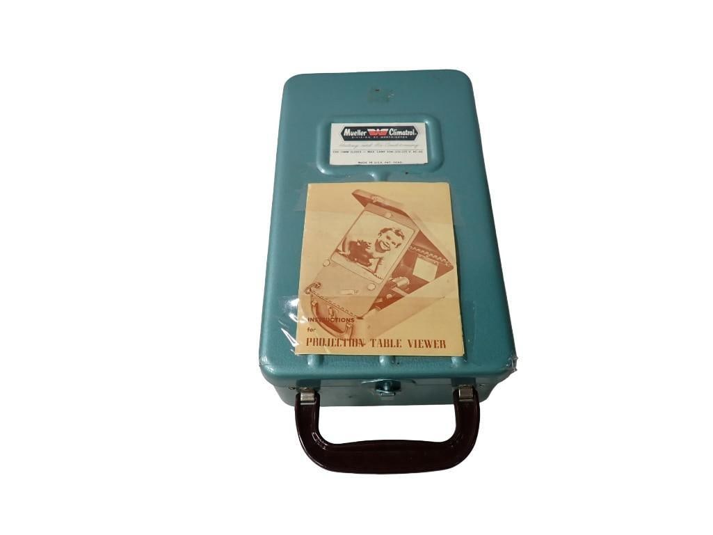 Vintage Portable Mueller Climatrol Slide Projection Table Viewer: Vintage Portable Mueller Climatrol Slide Projection Table Viewer All pictures are considered part of the description and should be examined carefully by bidders. Live Auctioneers is now offering Live 