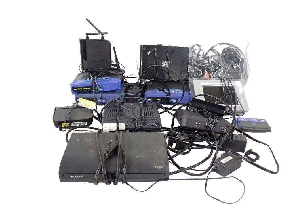 Lot of computer and electronics equipment including Routers, switches, cords, Magnavox SDTV, etc. (1 of 14)