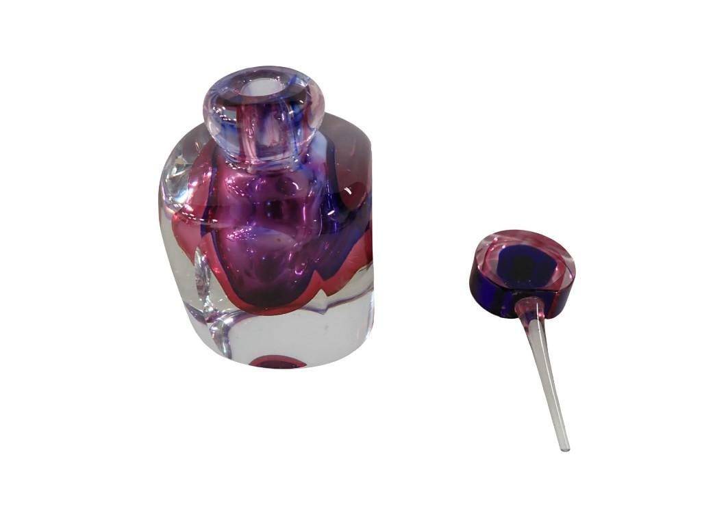 Murano style Sommerso glass Perfume Bottle with bull's-eye stopper: Murano style Sommerso glass Perfume Bottle with bull's-eye stopper All pictures are considered part of the description and should be examined carefully by bidders. Live Auctioneers is now offering