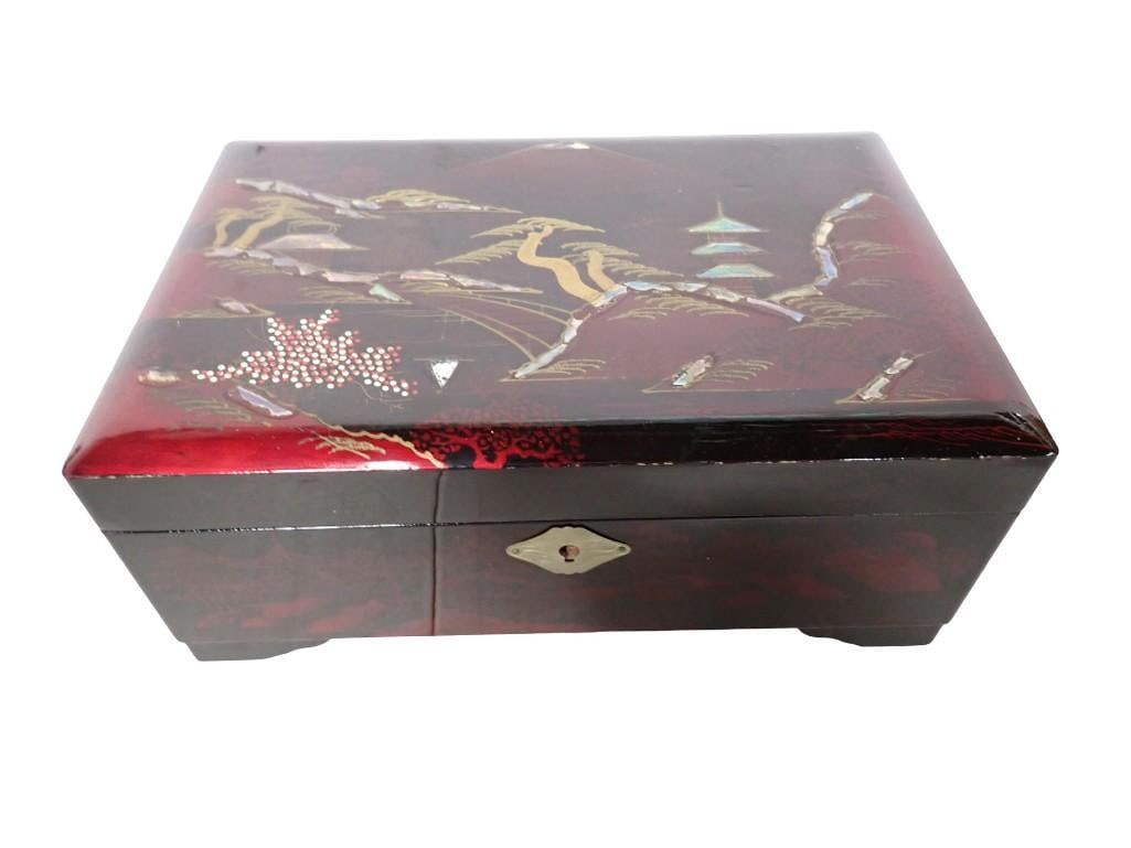 Lacquered Asian Design Jewelry Box with Purple Velvet interior: Lacquered Asian Design Jewelry Box with Purple Velvet interior All pictures are considered part of the description and should be examined carefully by bidders. Live Auctioneers is now offering Live Sh