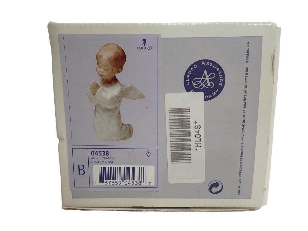 Lladro Angel Praying Figurine 04538 with box: Lladro Angel Praying Figurine 04538 with box All pictures are considered part of the description and should be examined carefully by bidders. Live Auctioneers is now offering Live Shipping through the