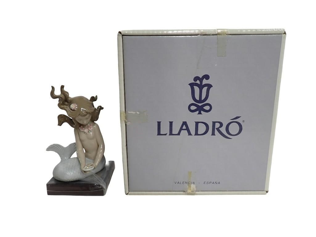 Lladro Mirage Porcelain Figurine with box: Lladro Mirage Porcelain Figurine with box All pictures are considered part of the description and should be examined carefully by bidders. Live Auctioneers is now offering Live Shipping through them. 