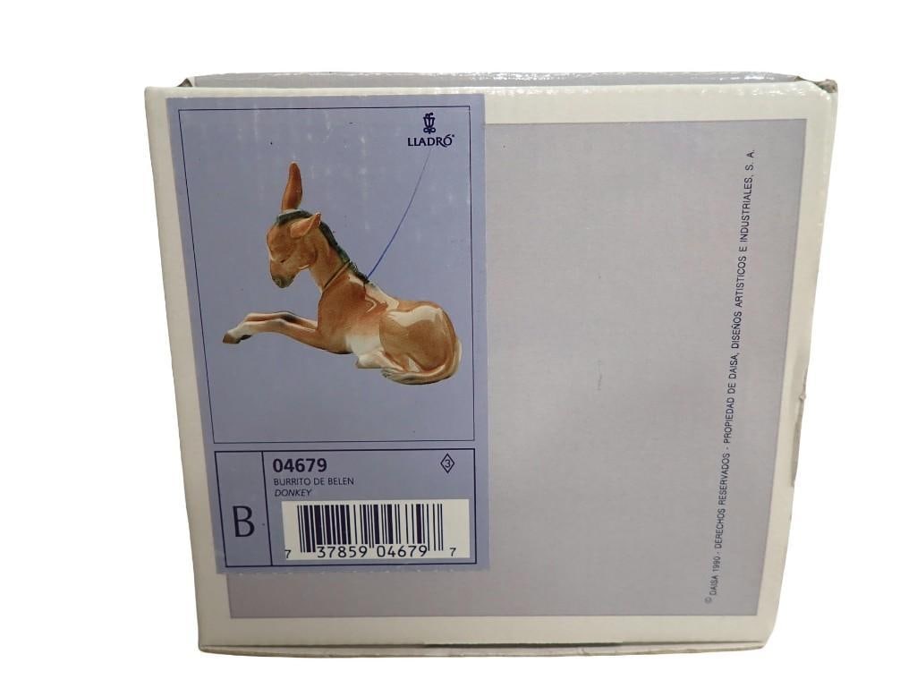 Lladro Porcelain Figurine - Donkey 04679 with box: Lladro Porcelain Figurine - Donkey 04679 with box All pictures are considered part of the description and should be examined carefully by bidders. Live Auctioneers is now offering Live Shipping throug