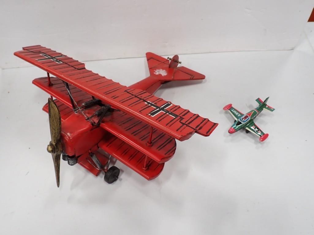 Red Baron Tri-Plane Metal Airplane and Japanese tin litho friction toy Army airplane: Red Baron Tri-Plane Metal Airplane and Japanese tin litho friction toy Army airplane All pictures are considered part of the description and should be examined carefully by bidders. Live Auctioneers i