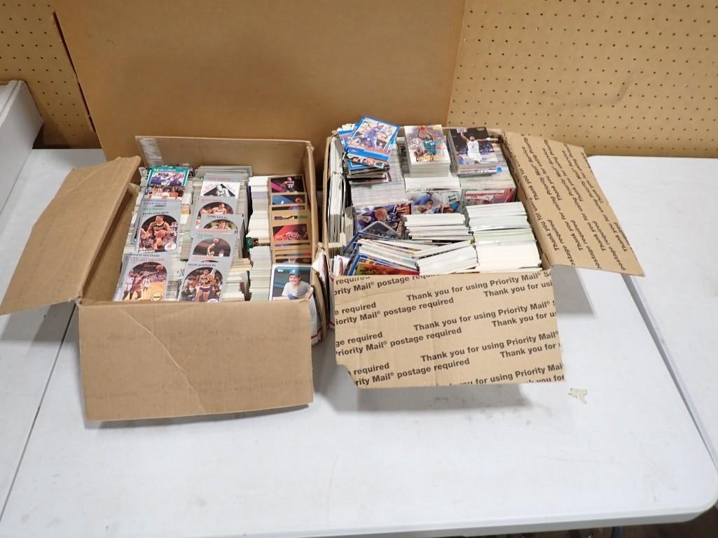Two boxes full of sports cards including basketball and baseball: Two boxes full of sports cards including basketball and baseball All pictures are considered part of the description and should be examined carefully by bidders. Live Auctioneers is now offering Live 