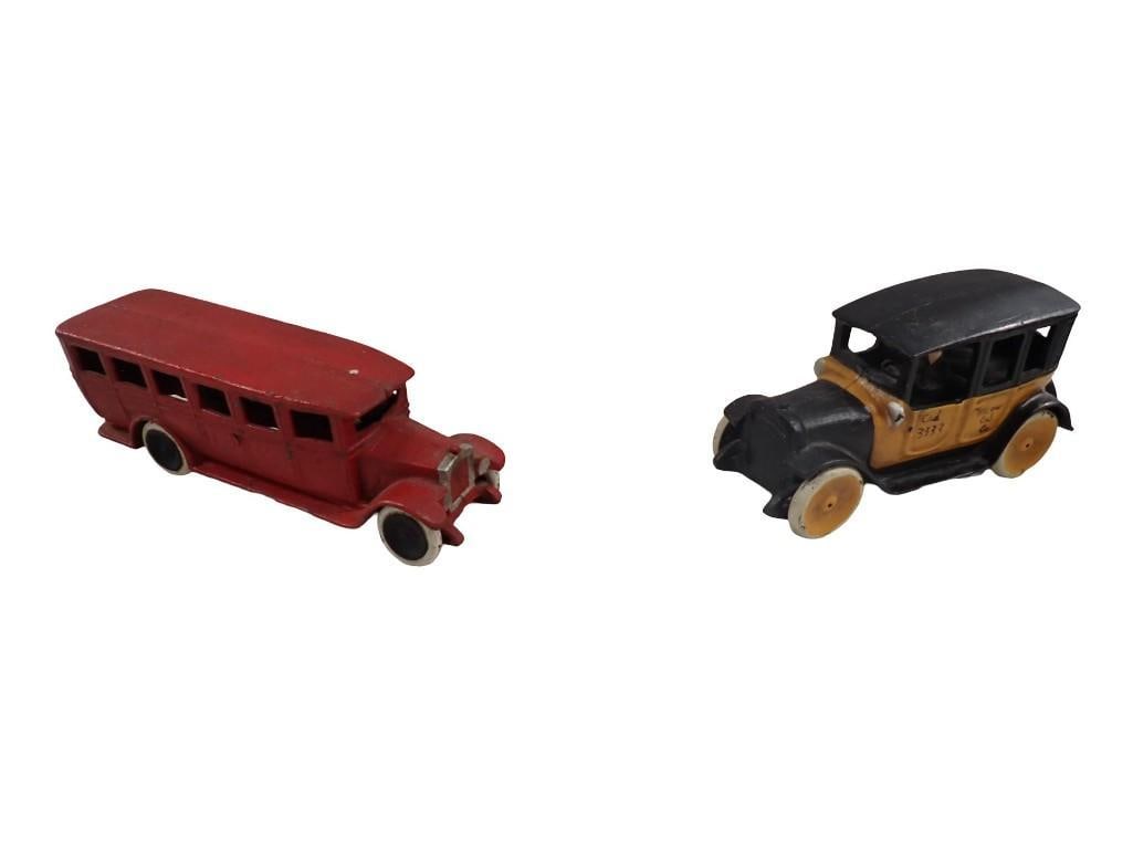 2 Cast Iron Toys incl a Car and a Bus: 2 Cast Iron Toys incl a Car and a Bus All pictures are considered part of the description and should be examined carefully by bidders. Live Auctioneers is now offering Live Shipping through them. This