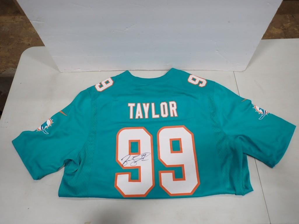 Jason Taylor Miami Dolphins #99 Autographed Football Jersey - No COA: Jason Taylor Miami Dolphins #99 Autographed Football Jersey - No COA All pictures are considered part of the description and should be examined carefully by bidders. Live Auctioneers is now offering L