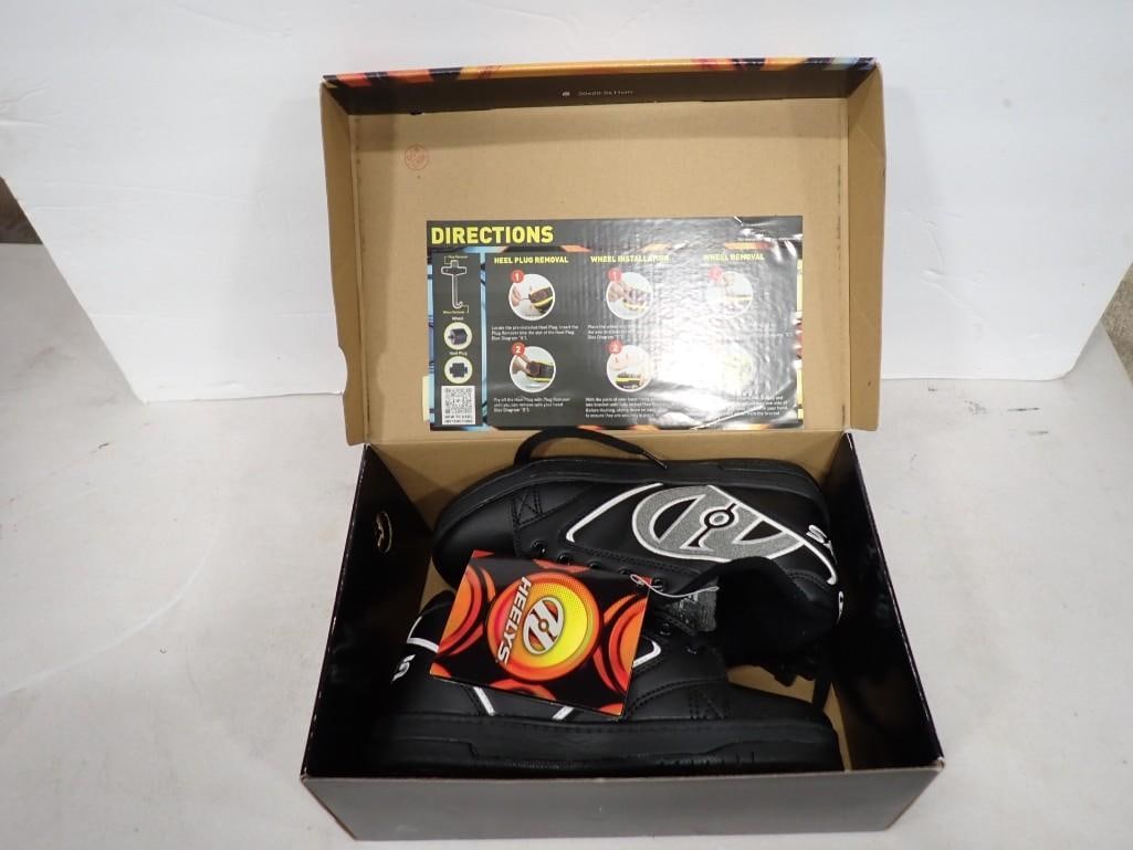 Pair of Heelys HE100033H Youth Size 5: Pair of Heelys HE100033H Youth Size 5 All pictures are considered part of the description and should be examined carefully by bidders. Live Auctioneers is now offering Live Shipping through them. This