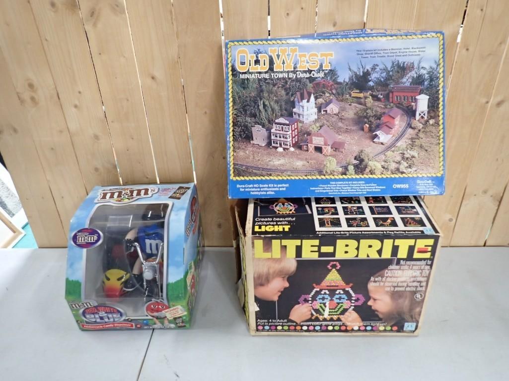 Toy Lot including Lite-Brite Game, M&M's Motorcycle, Old West HO Scale Miniature Town Set Dura-Craft (1 of 10)