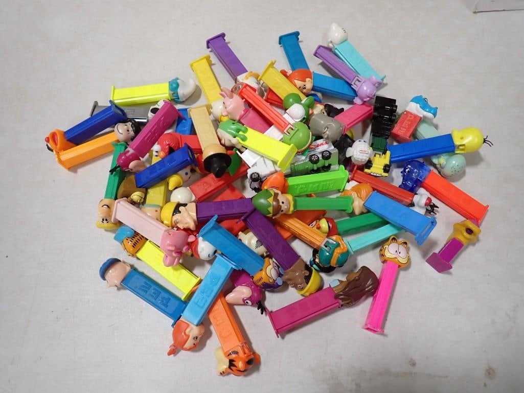 Lot of Pez Dispensers: Lot of Pez Dispensers All pictures are considered part of the description and should be examined carefully by bidders. Live Auctioneers is now offering Live Shipping through them. This is an optional 