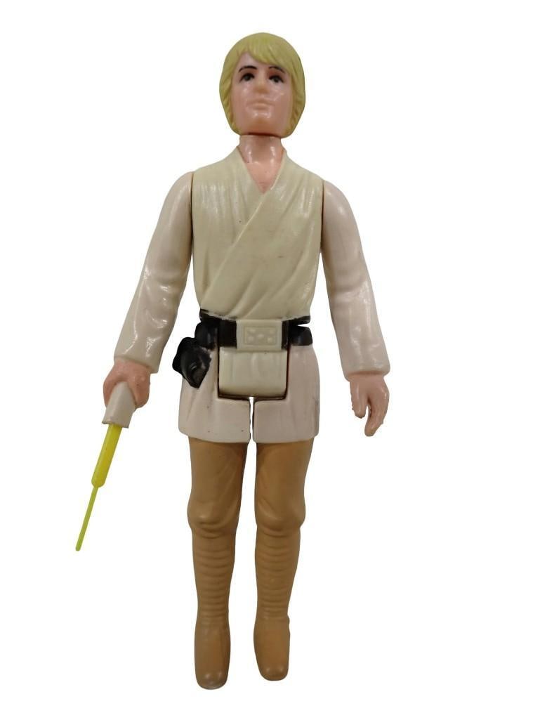 Vintage 1977 Kenner Star Wars "Farm Boy" Luke Skywalker action figure (1 of 7)