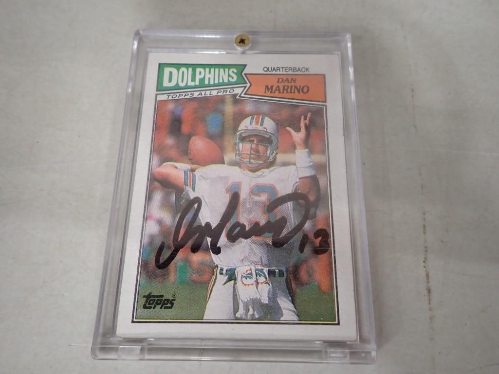 Dan Marino Autographed 1987 Topps Football Card - No COA: Dan Marino Autographed 1987 Topps Football Card - No COA All pictures are considered part of the description and should be examined carefully by bidders. Live Auctioneers is now offering Live Shipping