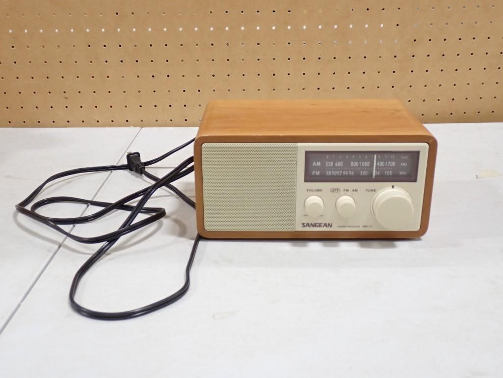 Retro Style Sangean WR-11 Wooden Cabinet AM/FM Tabletop Radio: Retro Style Sangean WR-11 Wooden Cabinet AM/FM Tabletop Radio All pictures are considered part of the description and should be examined carefully by bidders. Live Auctioneers is now offering Live Shi