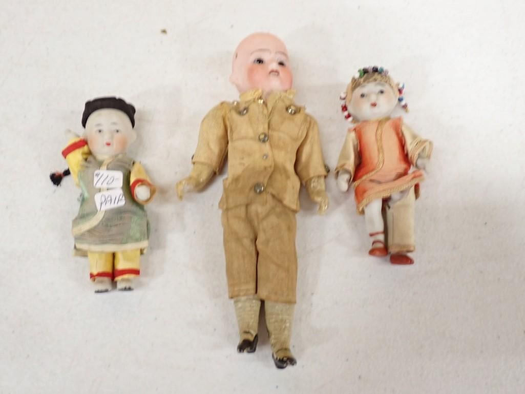 Antique Asian Porcelain Bisque Dolls, Made in Germany Soldier Doll: Antique Asian Porcelain Bisque Dolls, Made in Germany Soldier Doll All pictures are considered part of the description and should be examined carefully by bidders. Live Auctioneers is now offering Liv