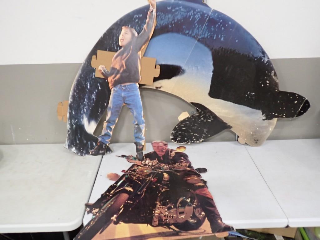 Movie Cardboard Cut Out Promotional Displays including Stone Cold, Free Willy, etc.: Movie Cardboard Cut Out Promotional Displays including Stone Cold, Free Willy, etc. All pictures are considered part of the description and should be examined carefully by bidders. Live Auctioneers is