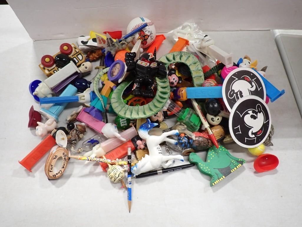 Lot of Smalls incl Pez Dispensers, Small Toys, Etc: Lot of Smalls incl Pez Dispensers, Small Toys, Etc All pictures are considered part of the description and should be examined carefully by bidders. Live Auctioneers is now offering Live Shipping throu