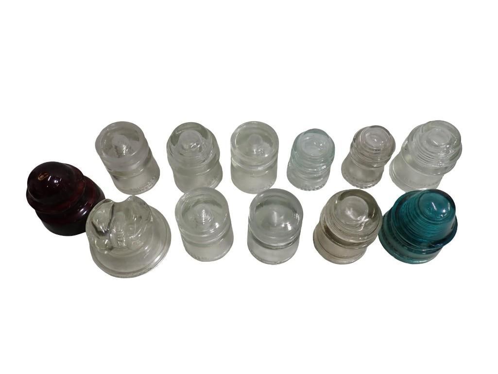 Lot of Asst Vintage Insulators: Lot of Assorted Vintage Electrical Insulators including a blue glass, clear glass, etc All pictures are considered part of the description and should be examined carefully by bidders. Live