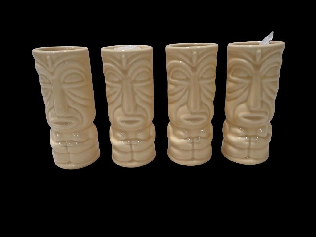 Set of 4 Tiki Mugs: Set of 4 Tiki Mugs All pictures are considered part of the description and should be examined carefully by bidders. Live Auctioneers is now offering Live Shipping through them. This is an optional pay