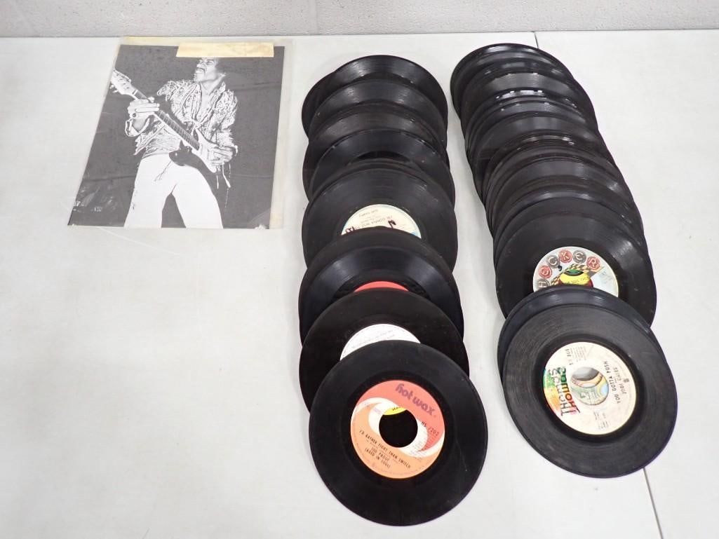 Vinyl 45 RPM Records and Jimi Hendrix Prints: Vinyl 45 RPM Records and Jimi Hendrix Prints All pictures are considered part of the description and should be examined carefully by bidders. Live Auctioneers is now offering Live Shipping through the