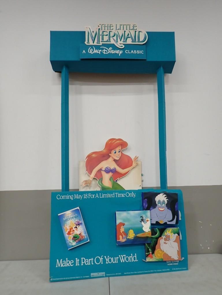 Vintage Walt Disney The Little Mermaid Home Video Cardboard Store Display Advertisement: Vintage Walt Disney The Little Mermaid Home Video Cardboard Store Display Advertisement All pictures are considered part of the description and should be examined carefully by bidders. Live Auctioneer