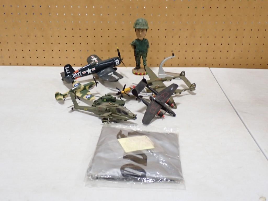Military Toy Lot including Bobblehead, Die-Cast Navy Airplane, Helicopter, other Airplanes, Goodyear: Military Toy Lot including Bobblehead, Die-Cast Navy Airplane, Helicopter, other Airplanes, Goodyear inflatable All pictures are considered part of the description and should be examined carefully by 