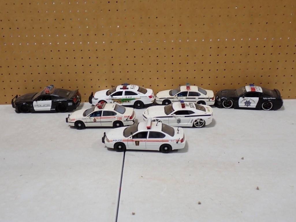 Lot of Model Die-Cast Police Cars: Lot of Model Die-Cast Police Cars All pictures are considered part of the description and should be examined carefully by bidders. Live Auctioneers is now offering Live Shipping through them. This is 