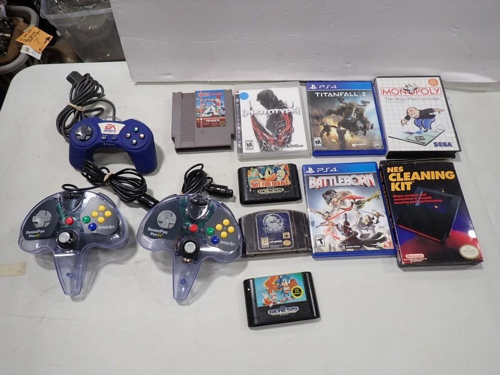 Video Game Lot including PlayStation EA Sports Controller, Nintendo 64 Controllers, NES RBI Baseball: Video Game Lot including PlayStation EA Sports Controller, Nintendo 64 Controllers, NES RBI Baseball, PS3 and 4 Games, Sega Monopoly Mega-Plus Cartridge, N64 Sub-Zero, NES Cleaning Kit, etc All pictur